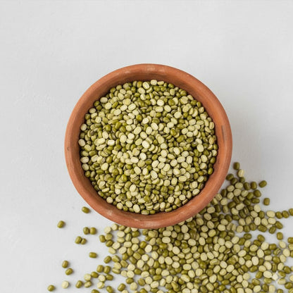 Bowl of green lentils in a mud bowl